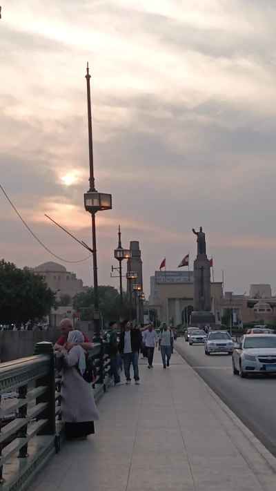 People Walking on Qasr El Nile Bridge, Cairo