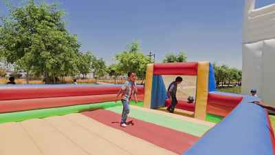 Double Kick Inside an Inflatable Playground