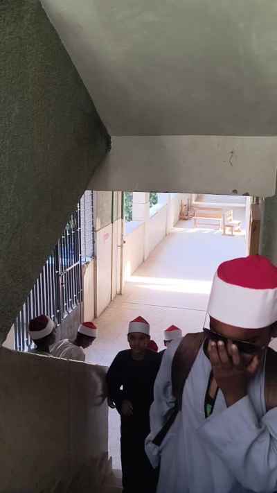 Al-Azhar Institute Students on School Stairs, Qena
