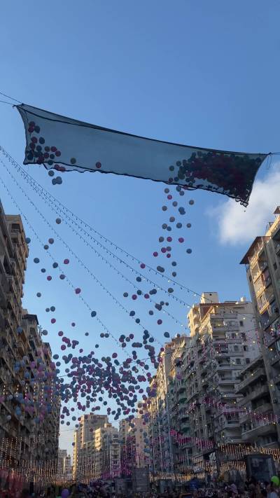 Balloons Falling Over Praying People After Eid Prayer in Alexandria