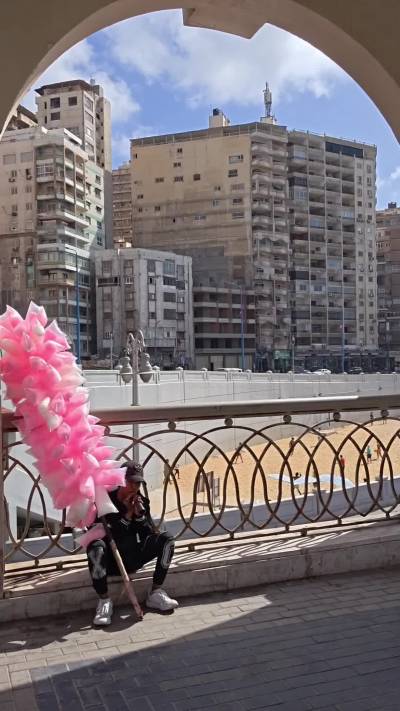 Traditional “Ghazel El Banat” Cotton Candy Seller in Egypt