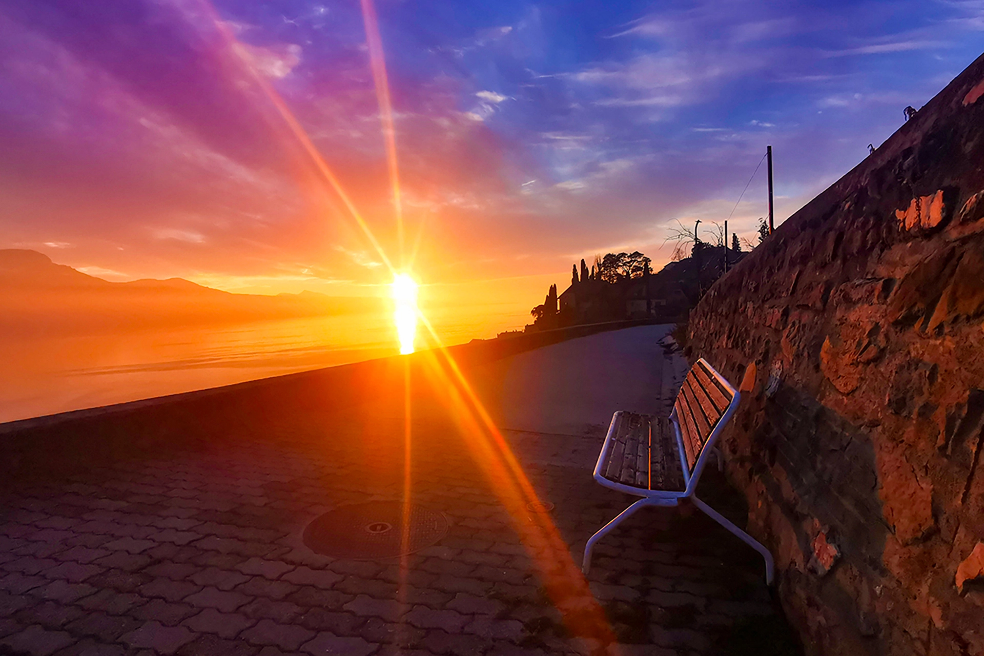 Tranquil Sunrise on the Lake Geneva Promenade