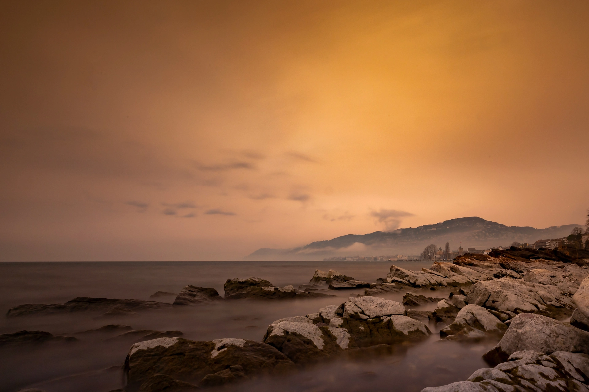 Lake Léman Under the Sahara’s Golden Veil