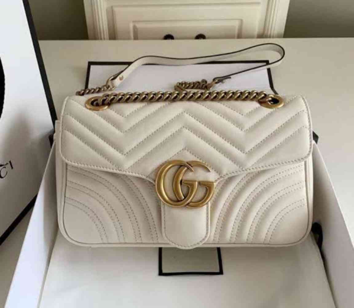Cream Gucci GG Marmont small Sling bag
