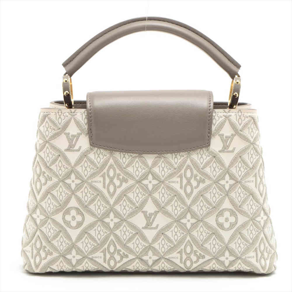 Louis Vuitton Capucines BB Since 1854 Monogram Jacquard Handbag-1