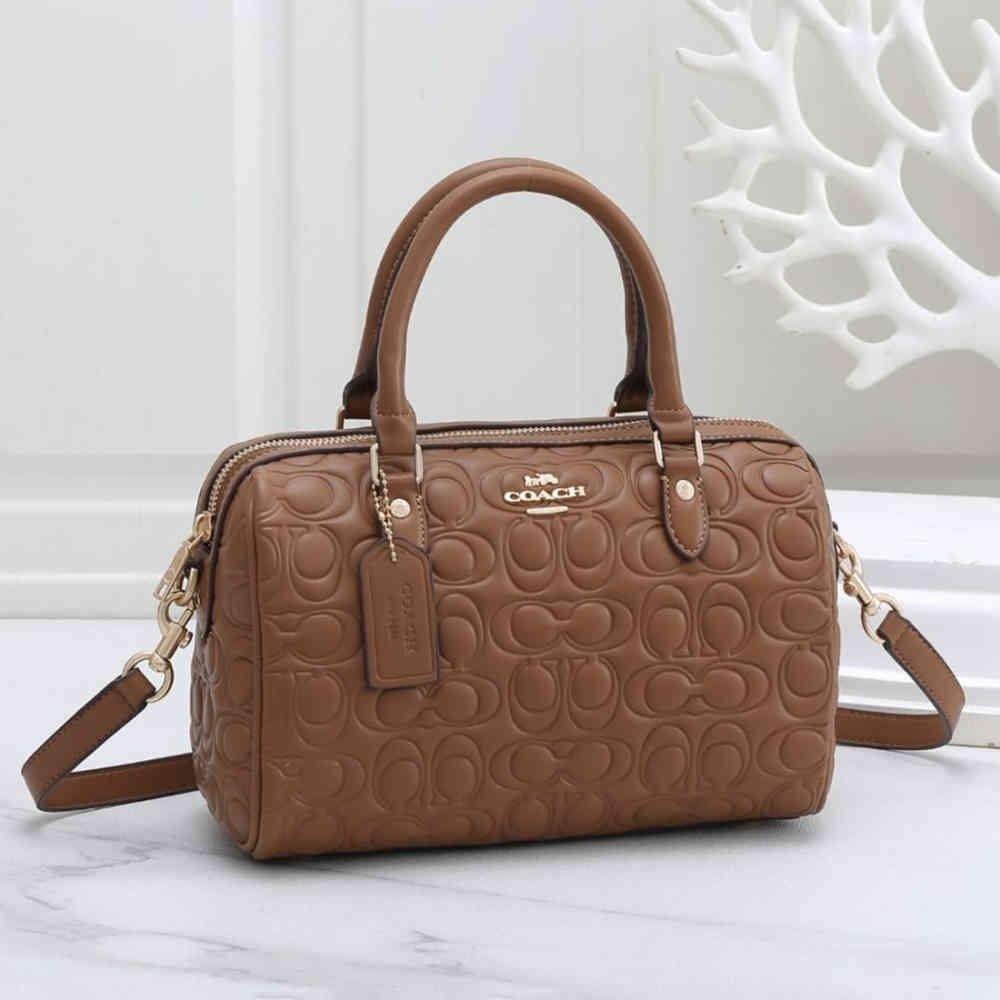 Brown Coach CC Embossed White Handbag