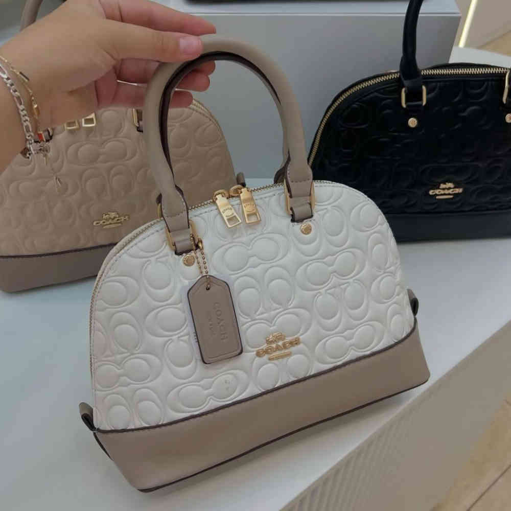 White Coach Alma Embossed Black Handbag