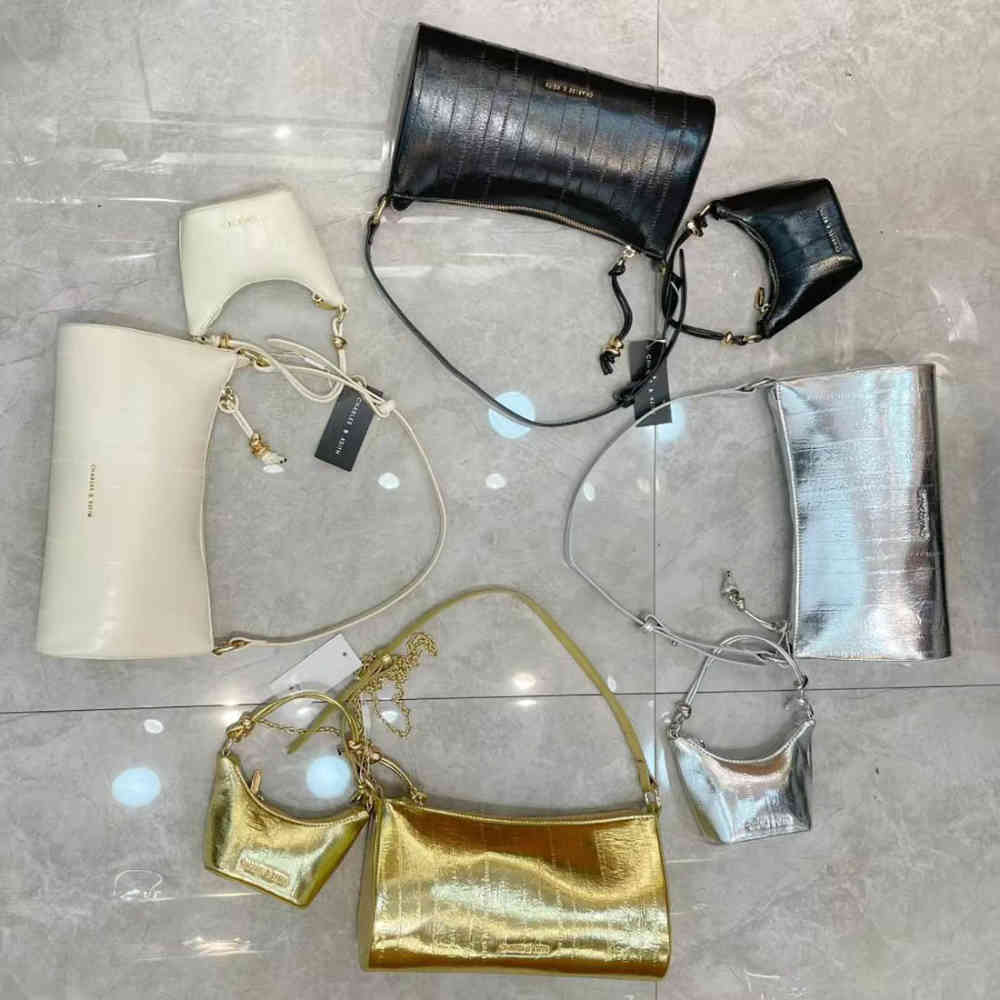 Charles & Keith Augustine Metallic Eel-Effect Black Sling Bag-thumb-1