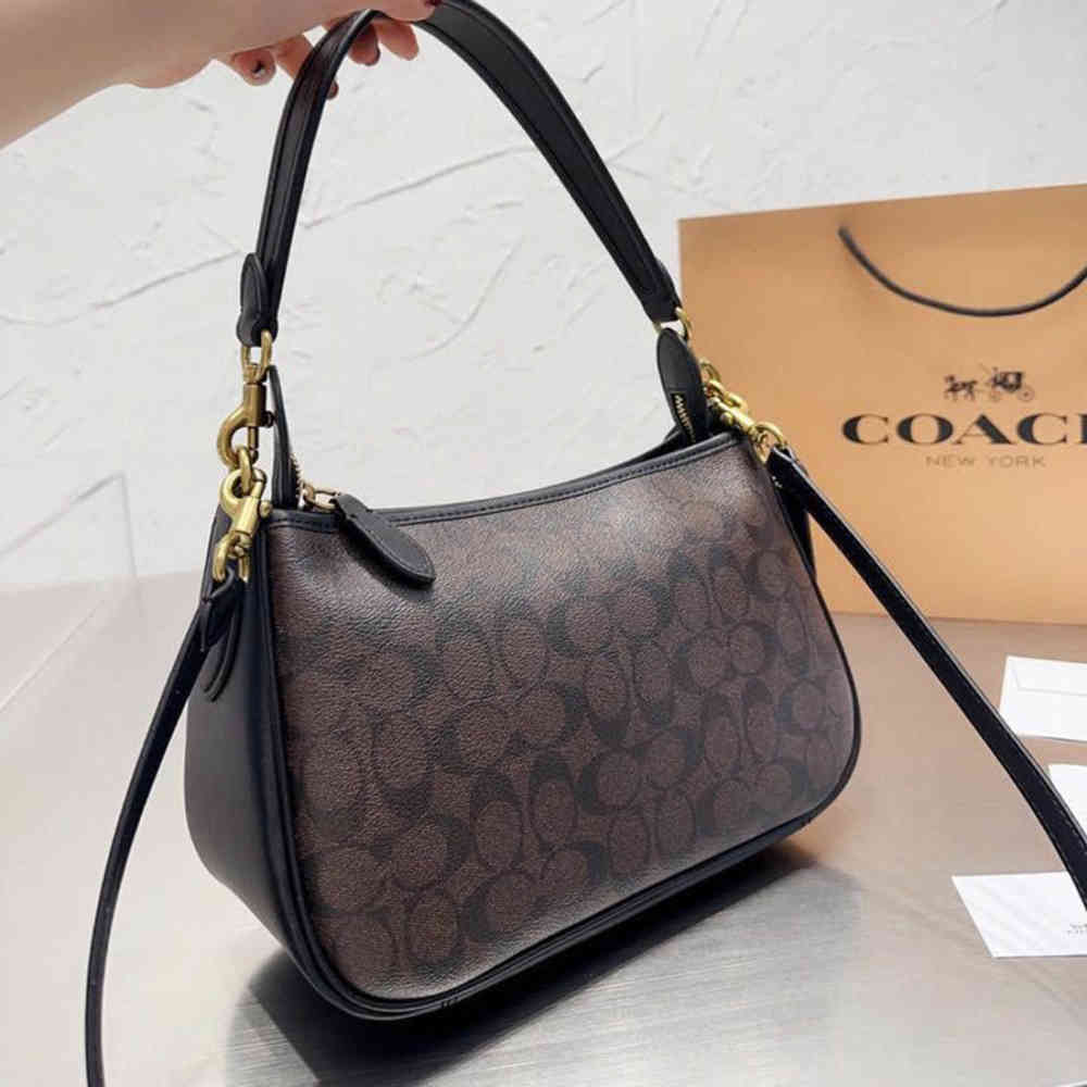 Black & Brown Coach Cary Cream Shoulder Bag