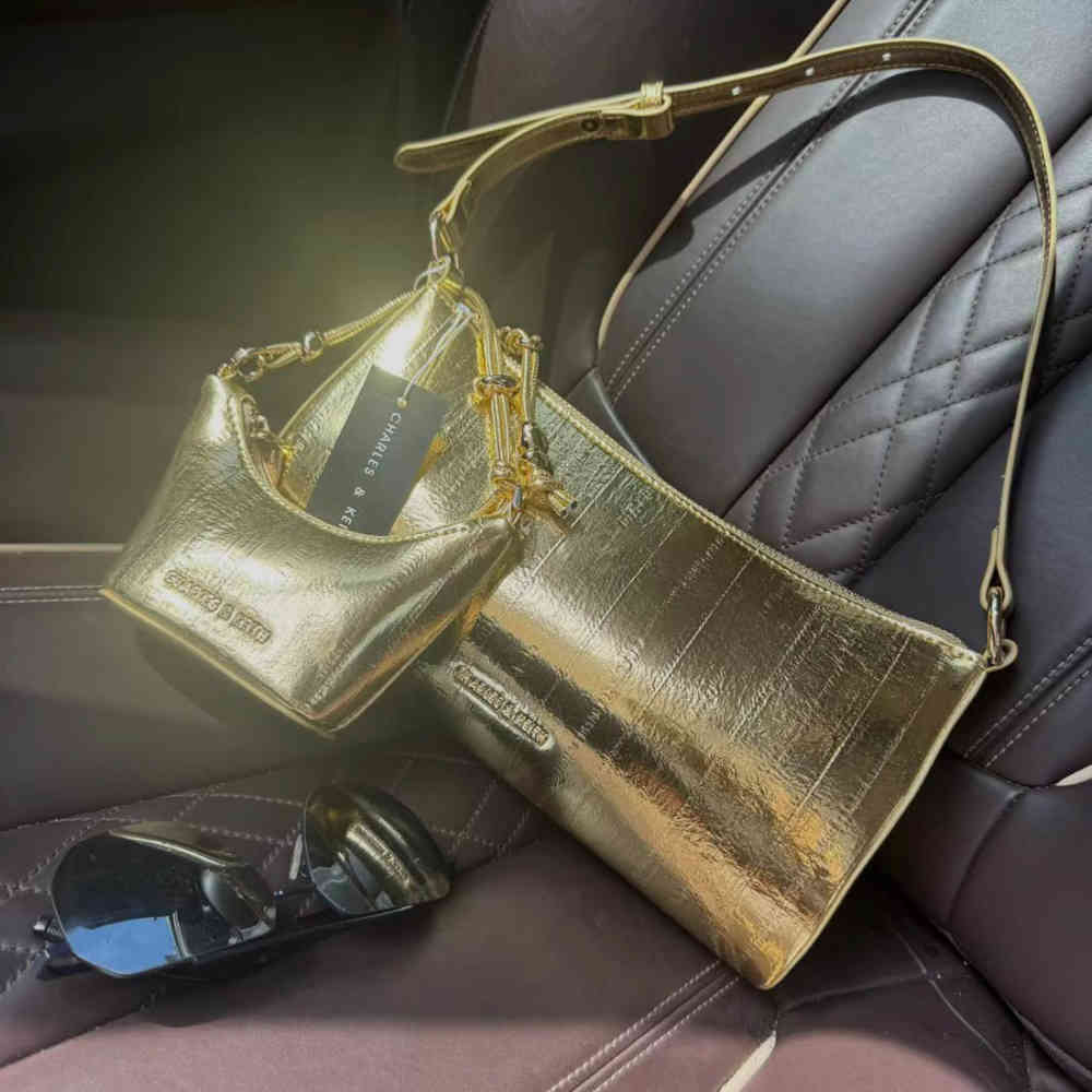 Golden Charles & Keith Augustine Metallic Eel-Effect Black Sling Bag