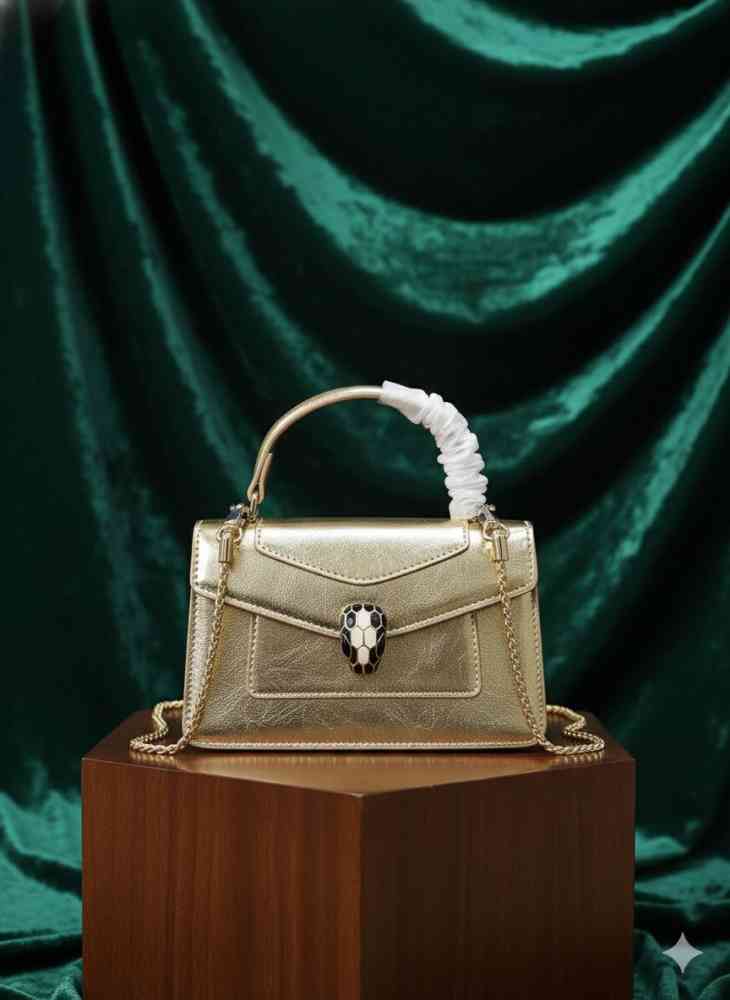 Golden Bvlgari Serpenti Forever Top Black Handbag