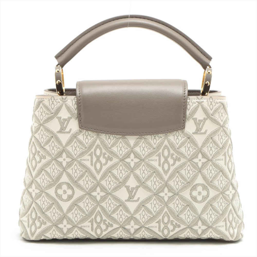 Louis Vuitton Capucines BB Since 1854 Monogram Jacquard Handbag-1