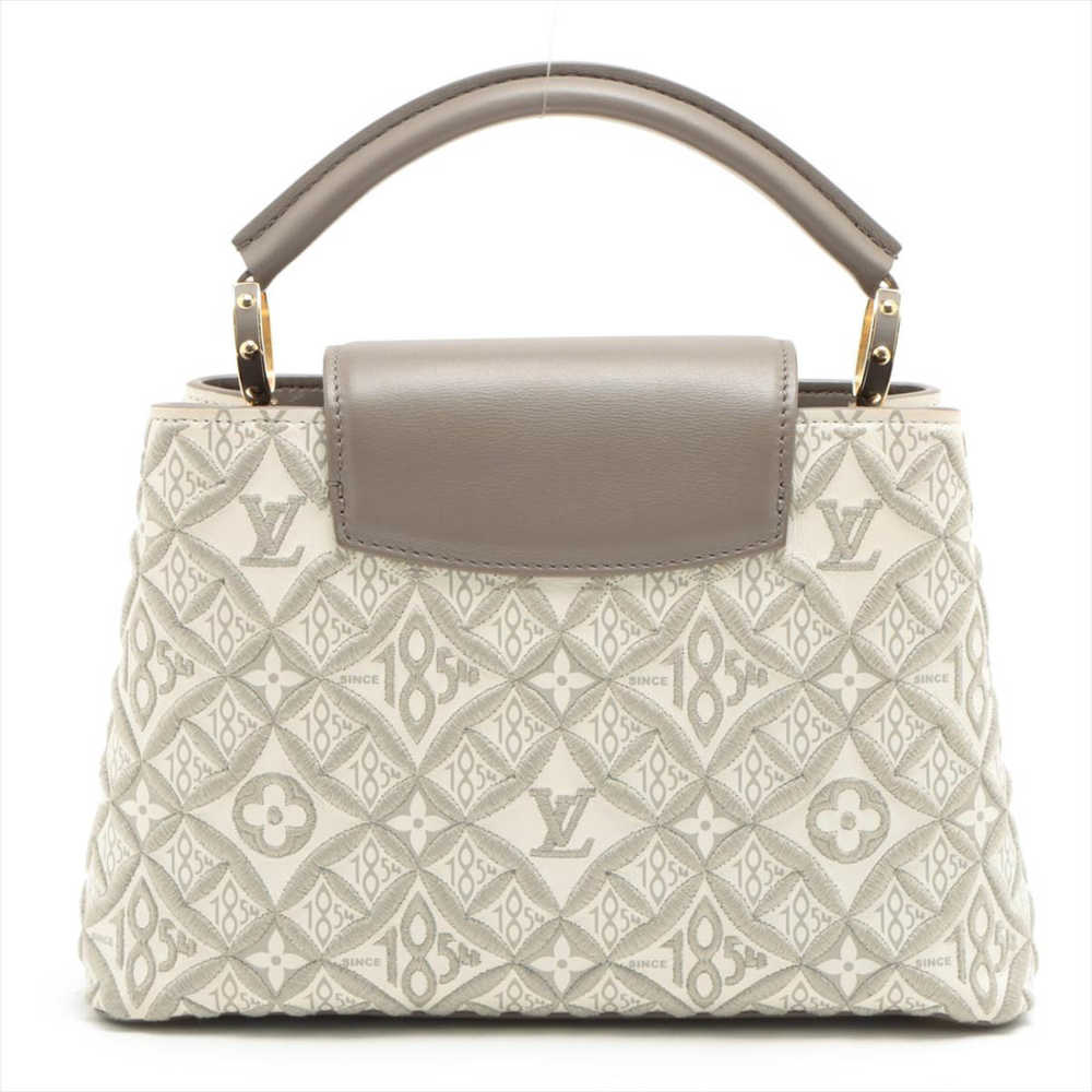 Louis Vuitton Capucines BB Since 1854 Monogram Jacquard Handbag-1