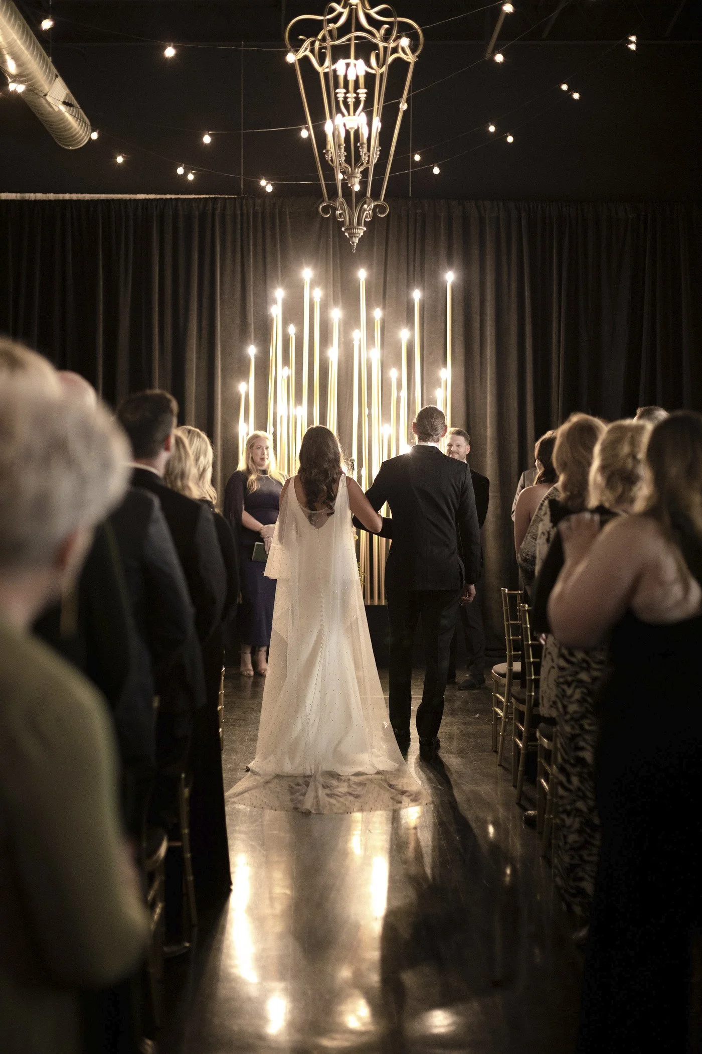 Bride and groom walking down the aisle