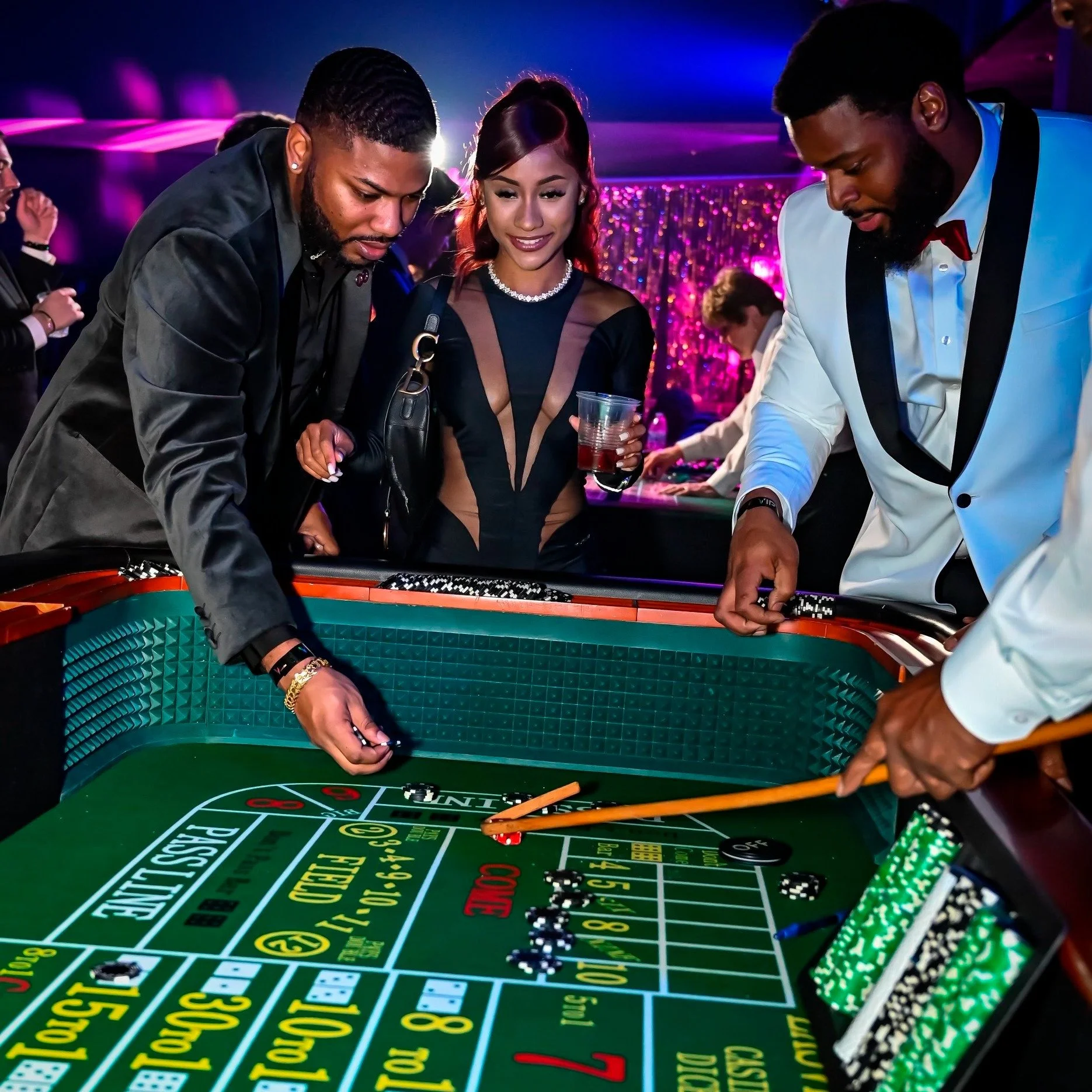 Guests playing casino games at a social event