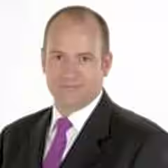 Warwick M.