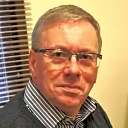 David E.