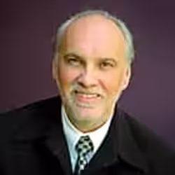 Claude B.