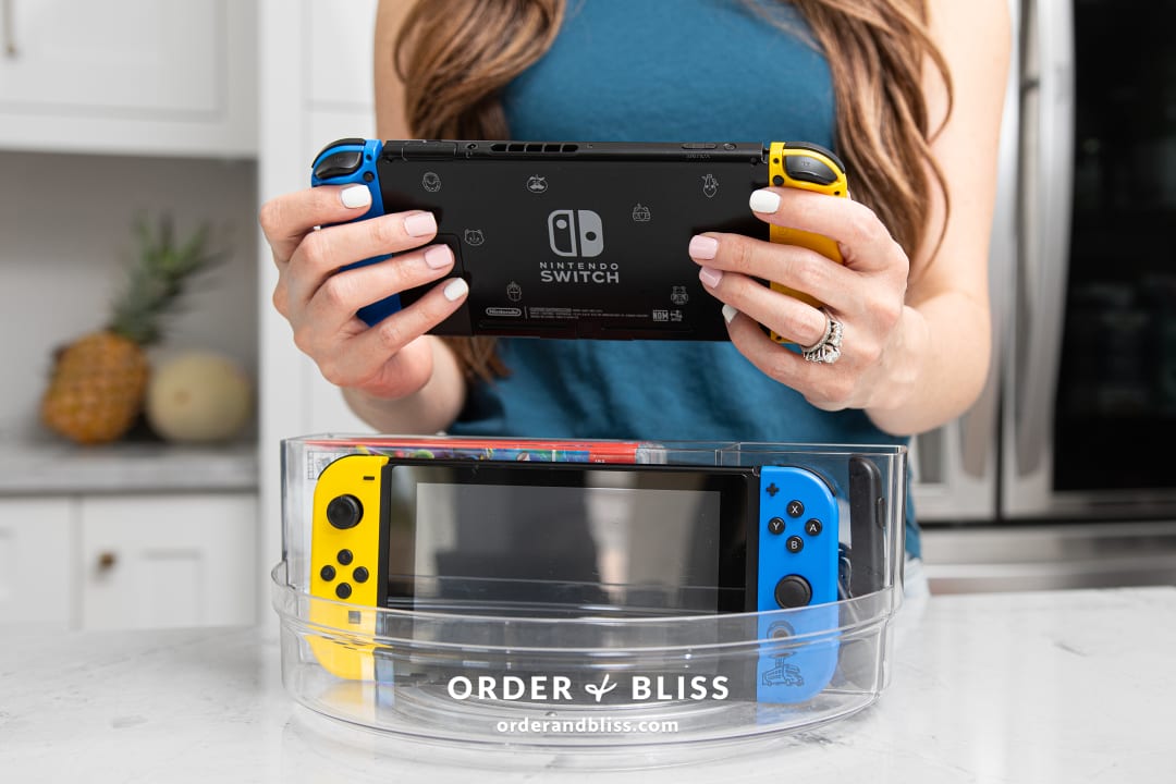 Spin the Console! This Clear Turntable Stores a Nintendo Switch, Joy-Con Controllers, Video Games, and More