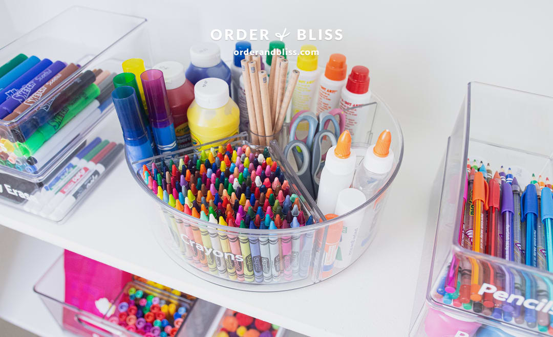 Organizing turntable with crayons, glue, and do-a-dots