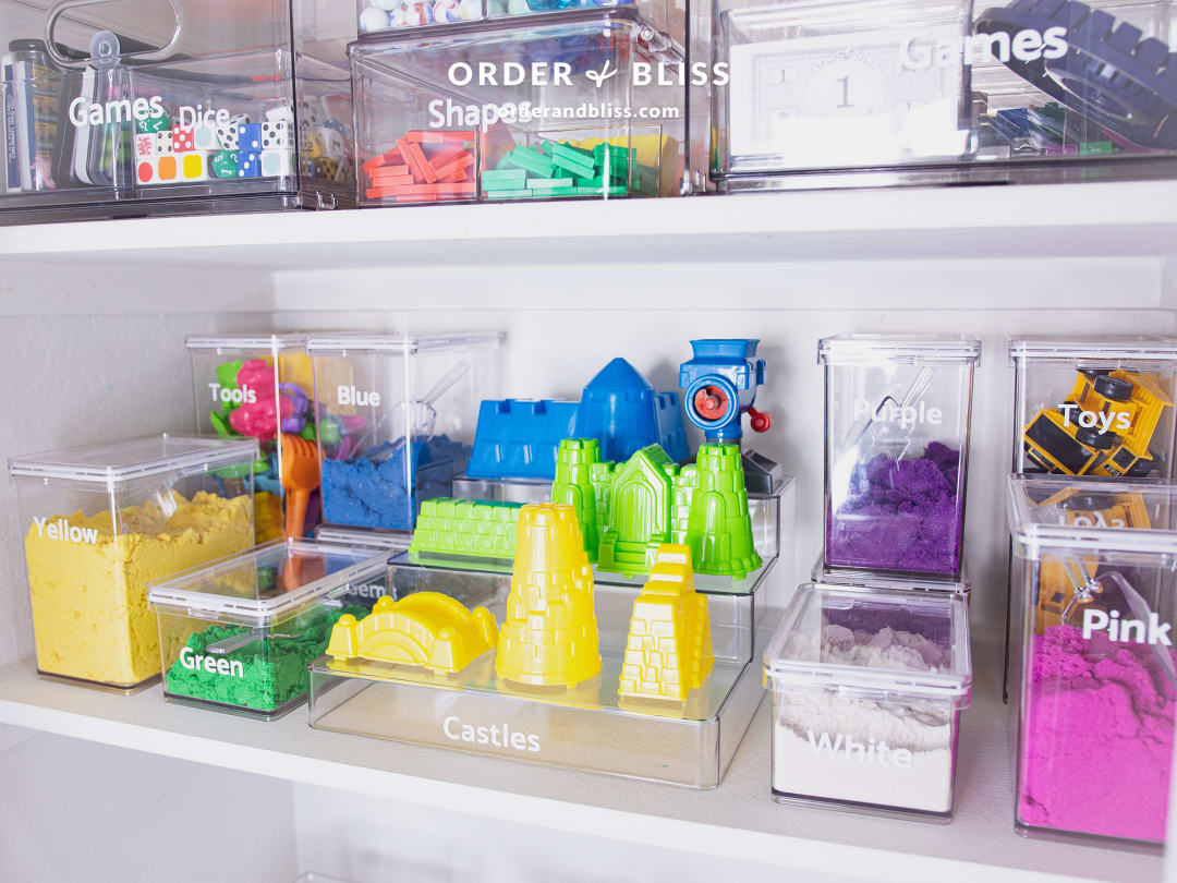 Kinetic sand castle shelf organization