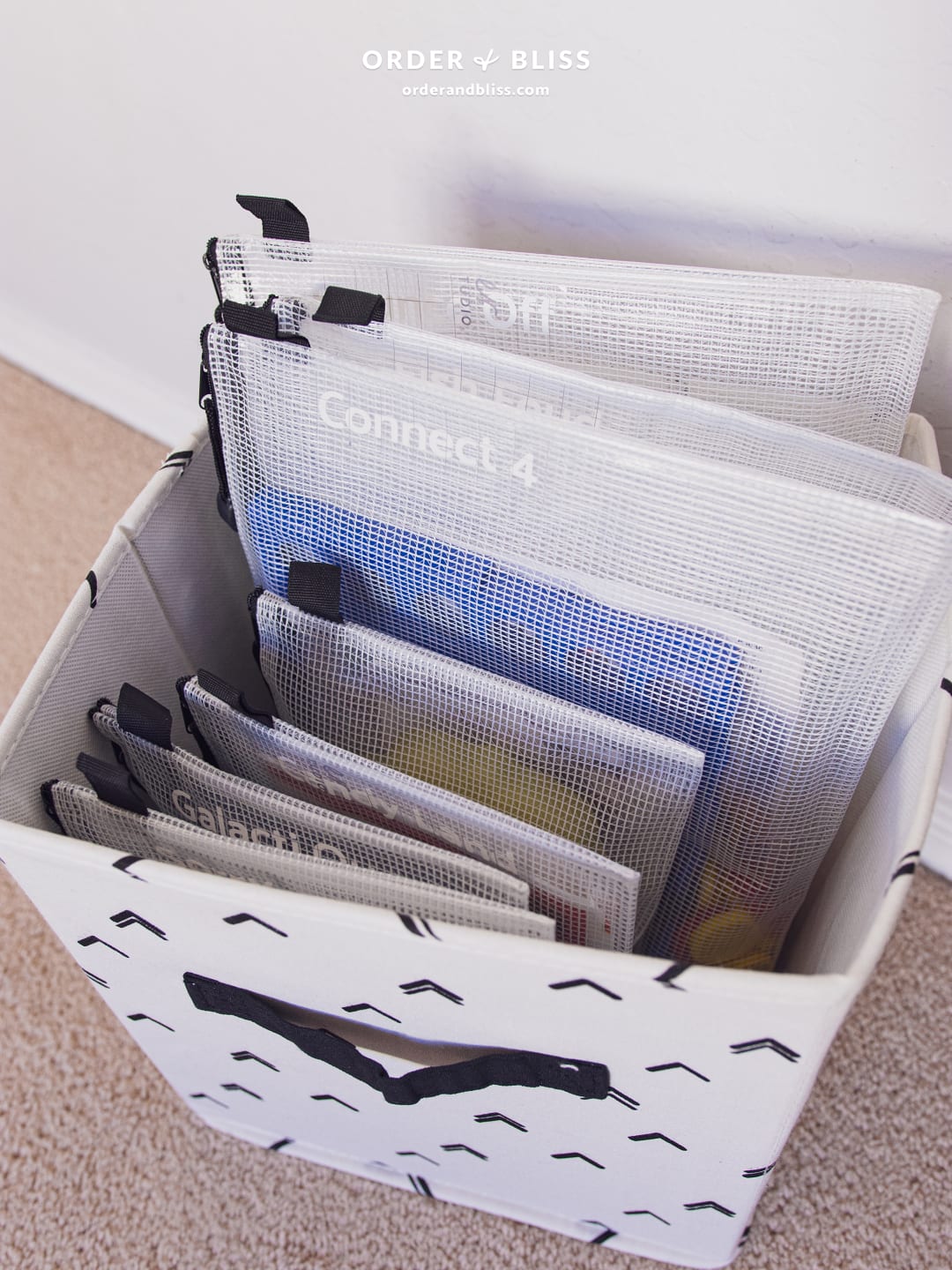 Zip top organizing utility totes in a bin