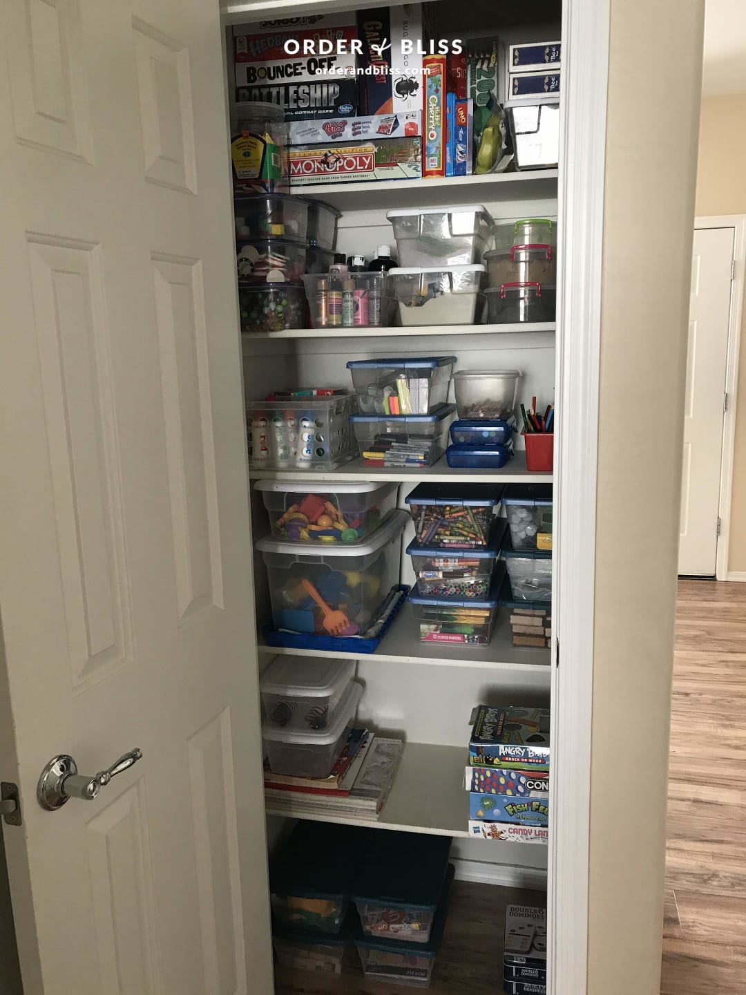 Home school game and craft closet before