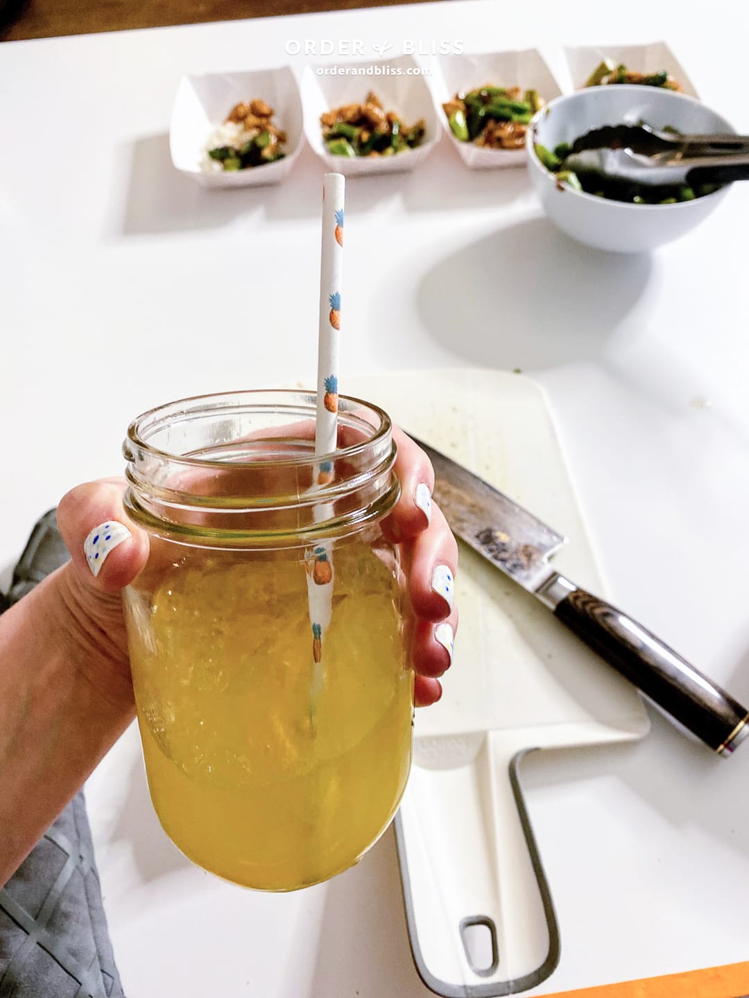 Mason jar margarita with pineapple straw