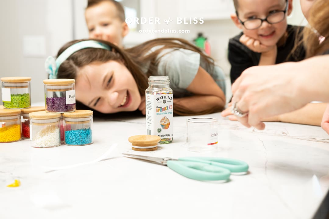 Clear glass jars with Watkins gluten free rainbow cupcake sprinkles