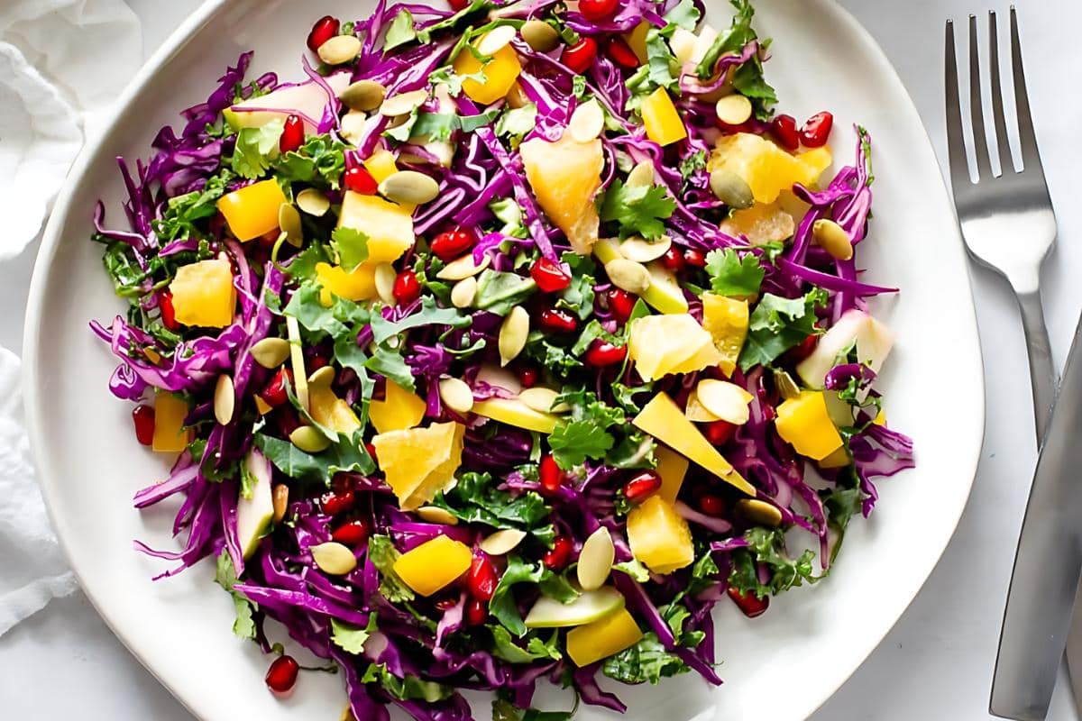 Rainbow detox salad with colorful fresh vegetables.