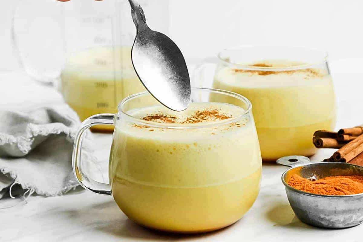 Golden turmeric coffee in a mug.