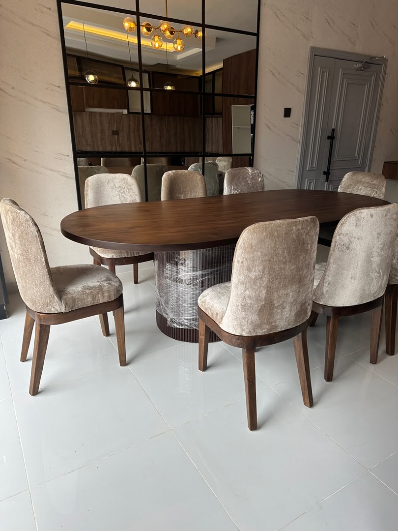 Oval Dining Table with Boucle Chairs