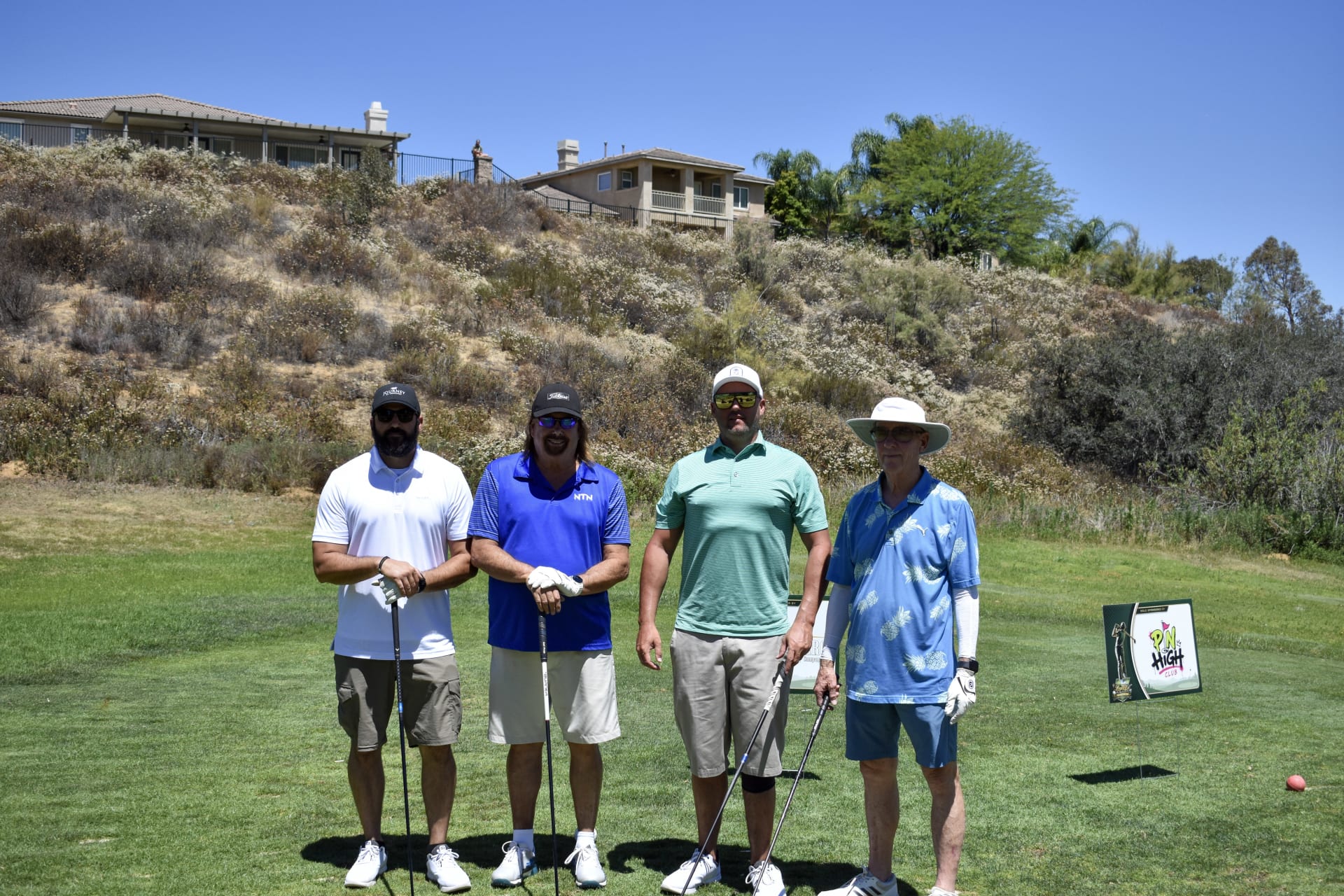 Players on the green at the 2026 Armenz Legacy Classic