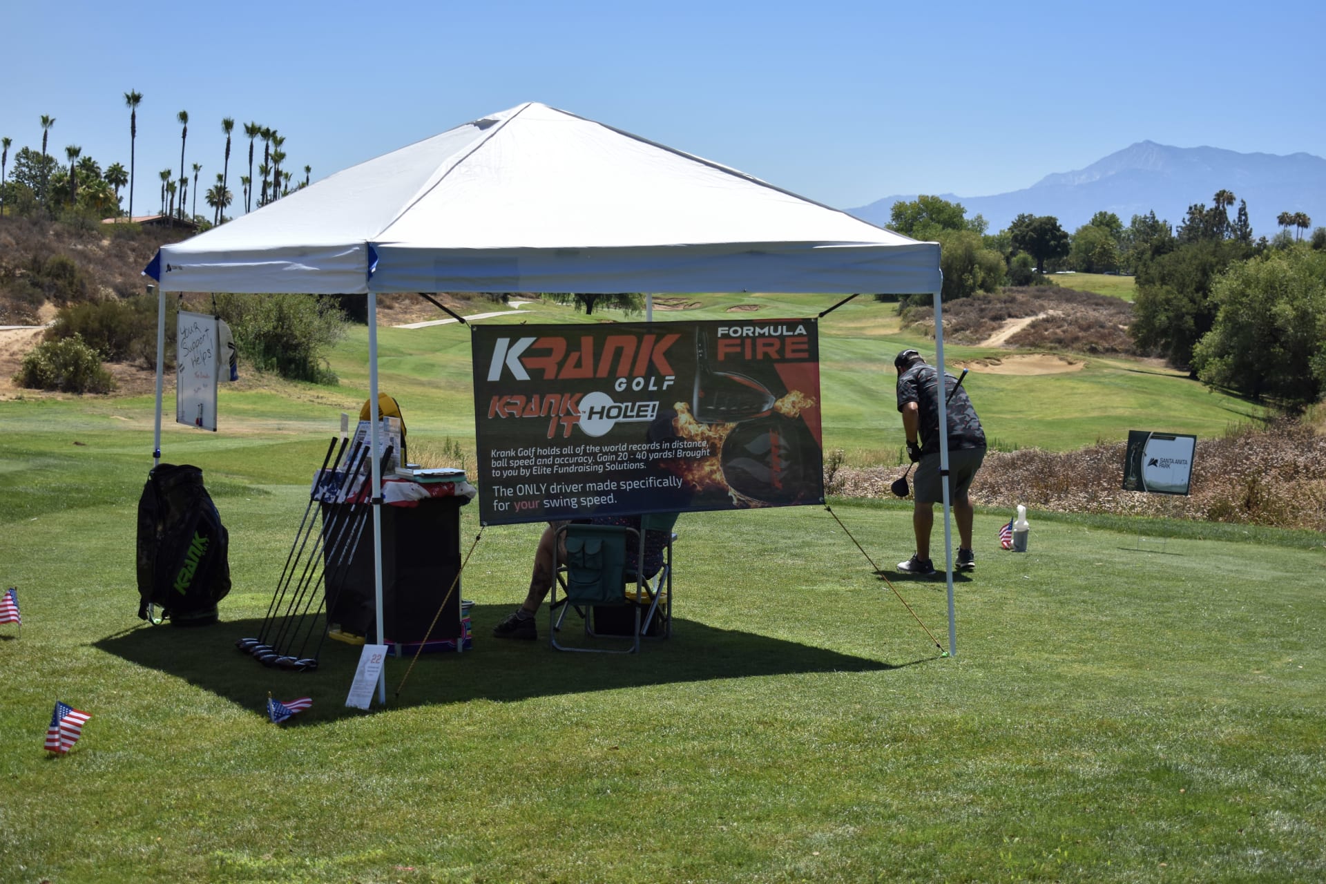 Sponsor tent and signage on the course at the Armenz Legacy Classic 2026