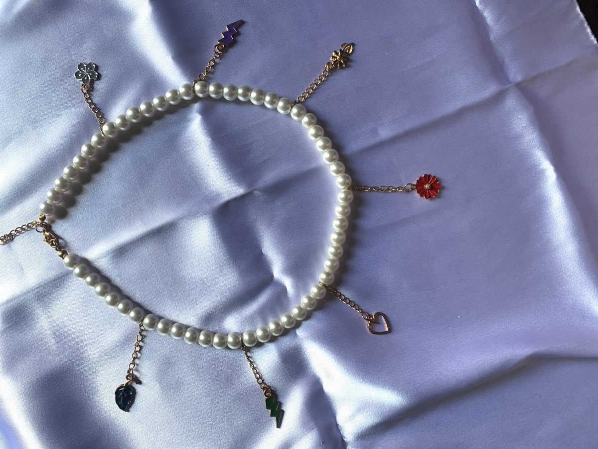 multi- charm pearl necklace
