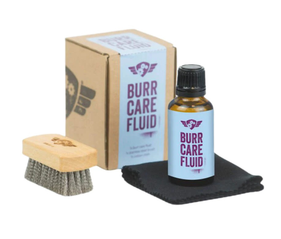 Набір для догляду за жорнами кавомолки: рідина, ганчірка і щітка для якісного очищення Сomandante