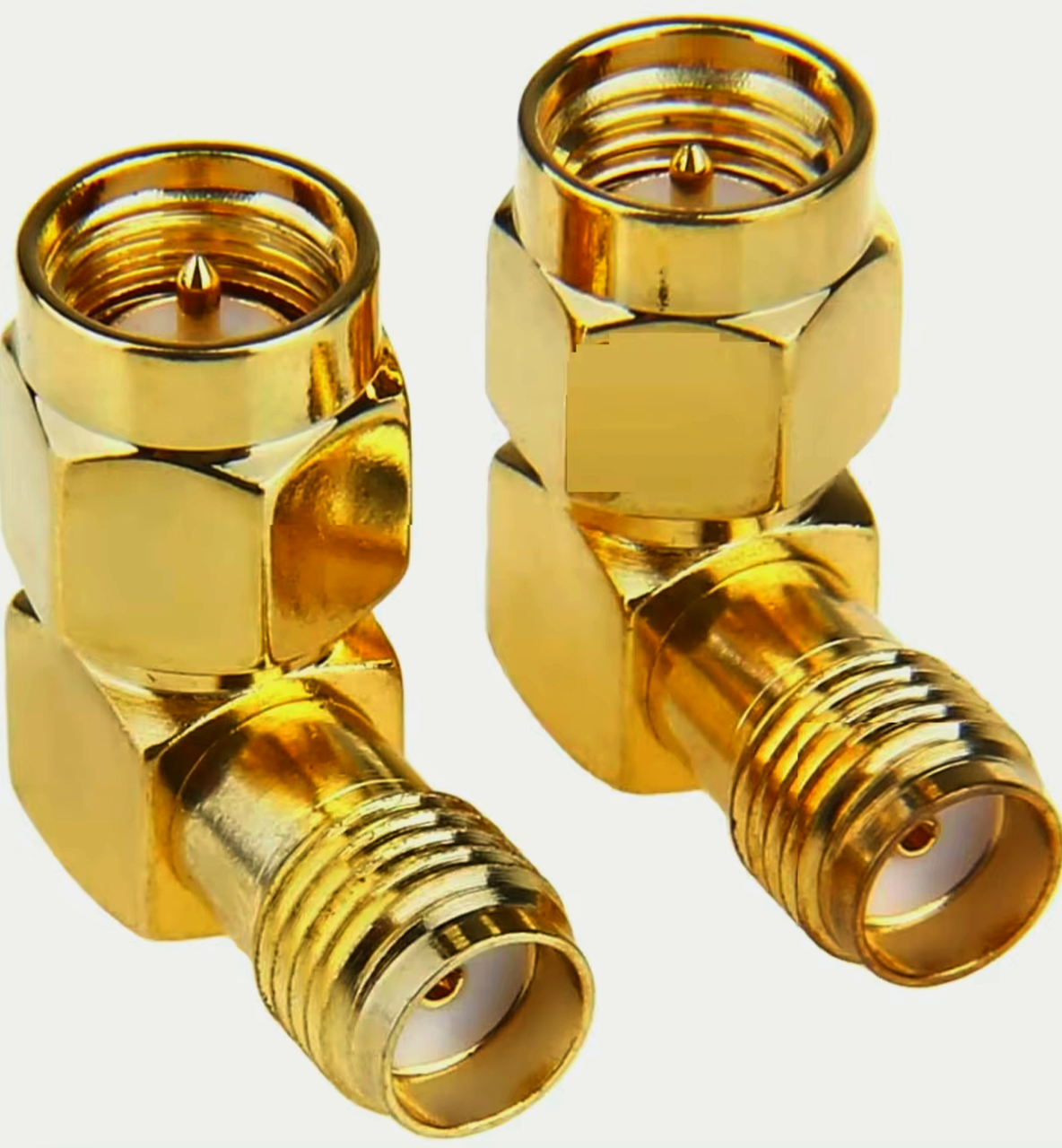 Адаптер SMA угловий проходний 90° штекер-гніздо 50 Ом металевий для радіочастотних зapos;єднань