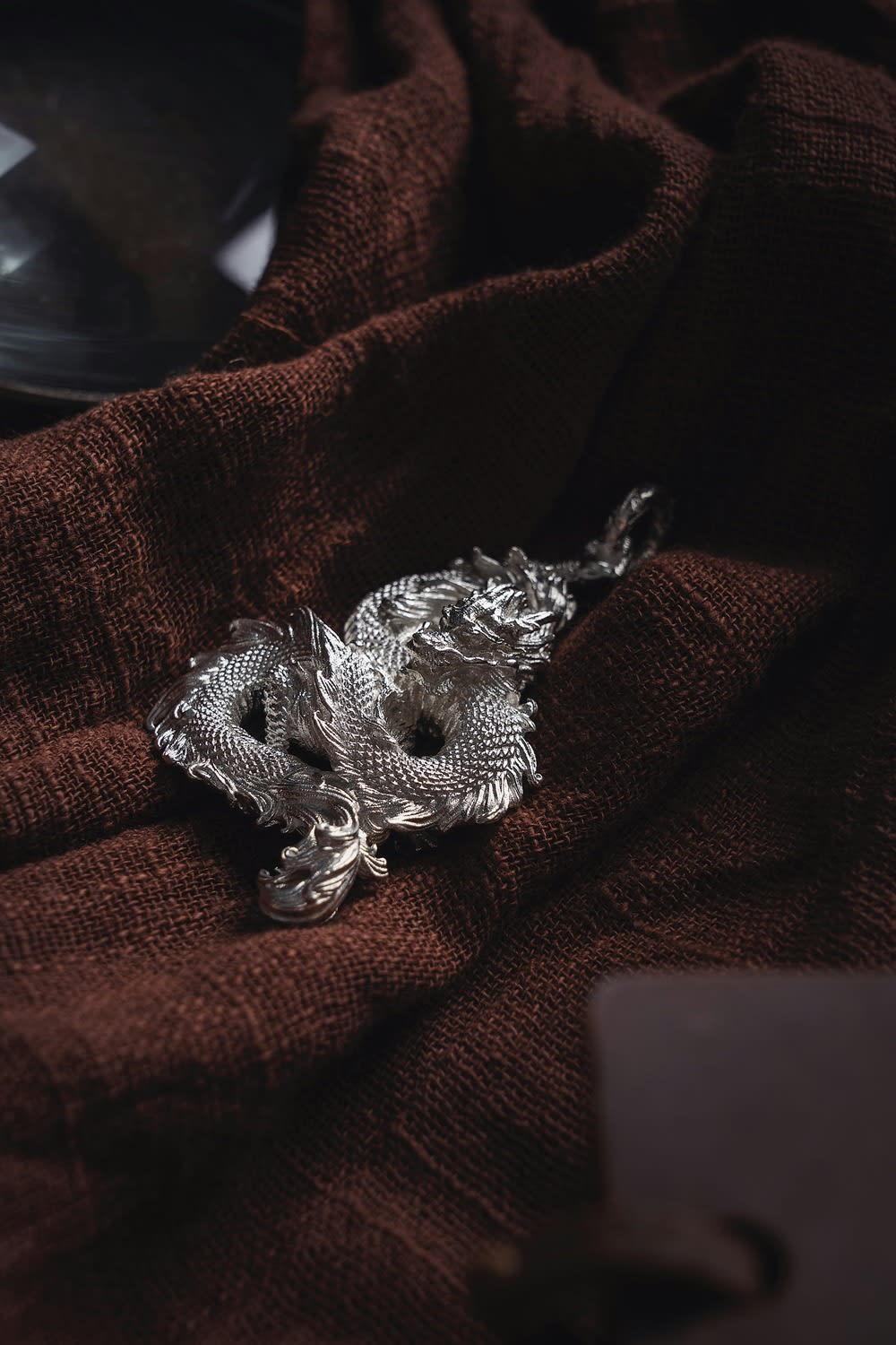 Contemporary fabric jewelry made from Indonesian lurik textile scraps