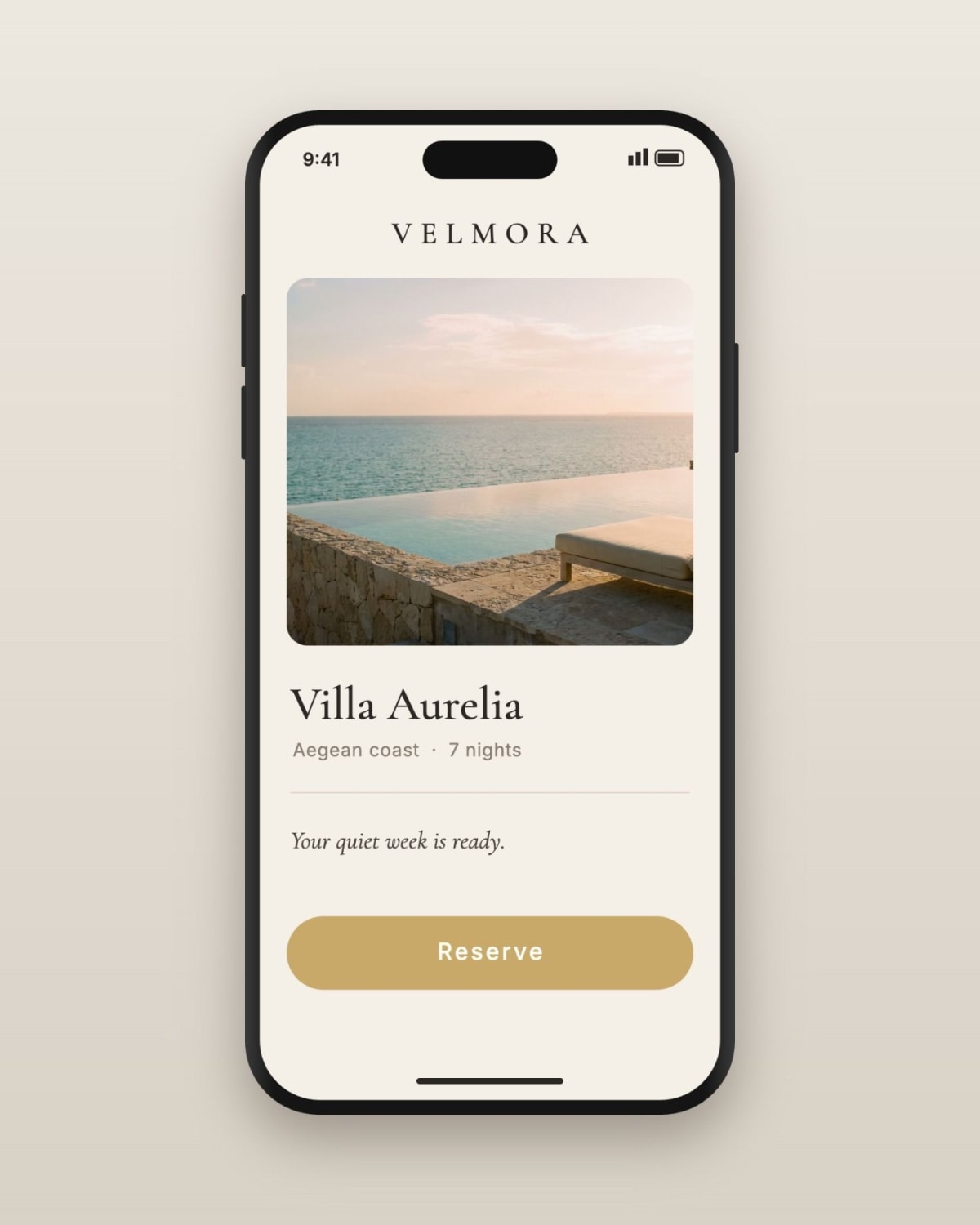 The VELMORA app screen: the wordmark, a photo of the villa, “Villa Aurelia”, “Aegean coast · 7 nights”, “Your quiet week is ready.” and a gold Reserve button.
