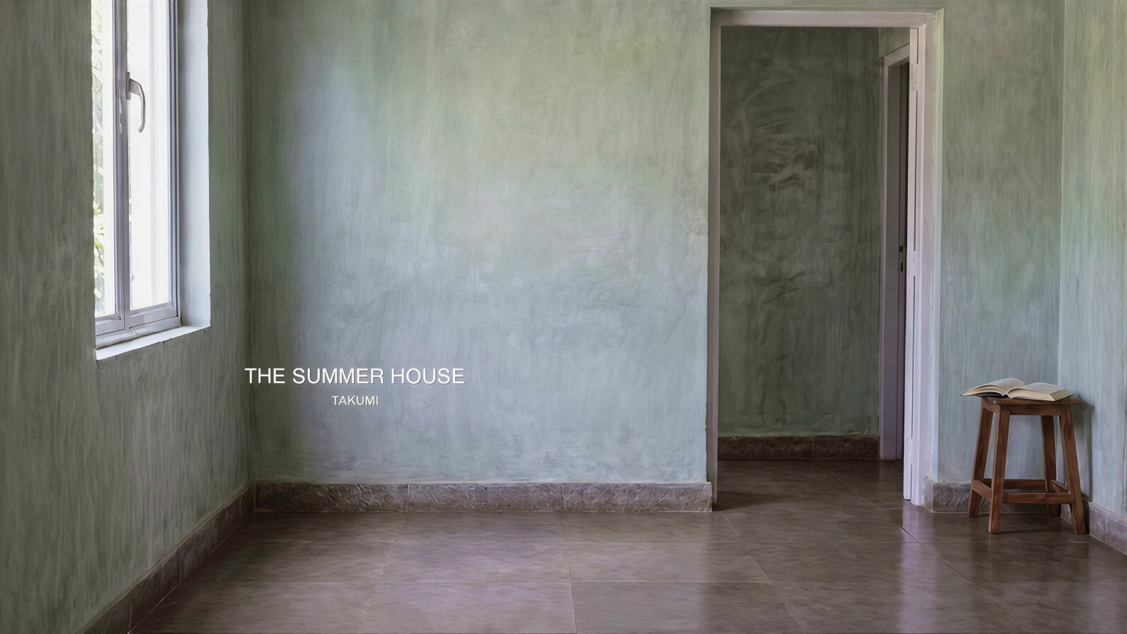 The empty sage-green room with the words THE SUMMER HOUSE and, smaller, TAKUMI on the wall.