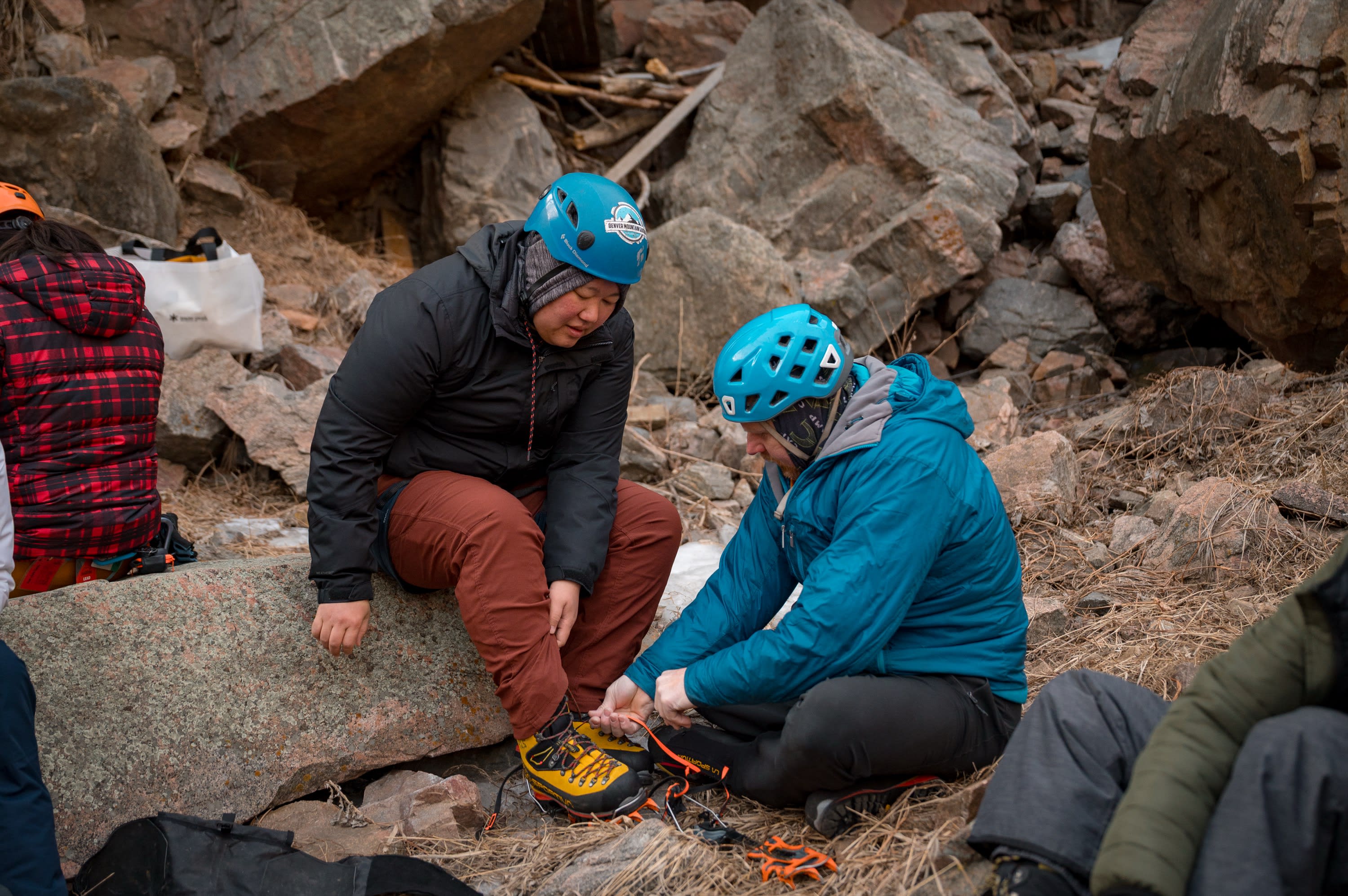 Cruxing in Color ice climbing event — ice wall approach