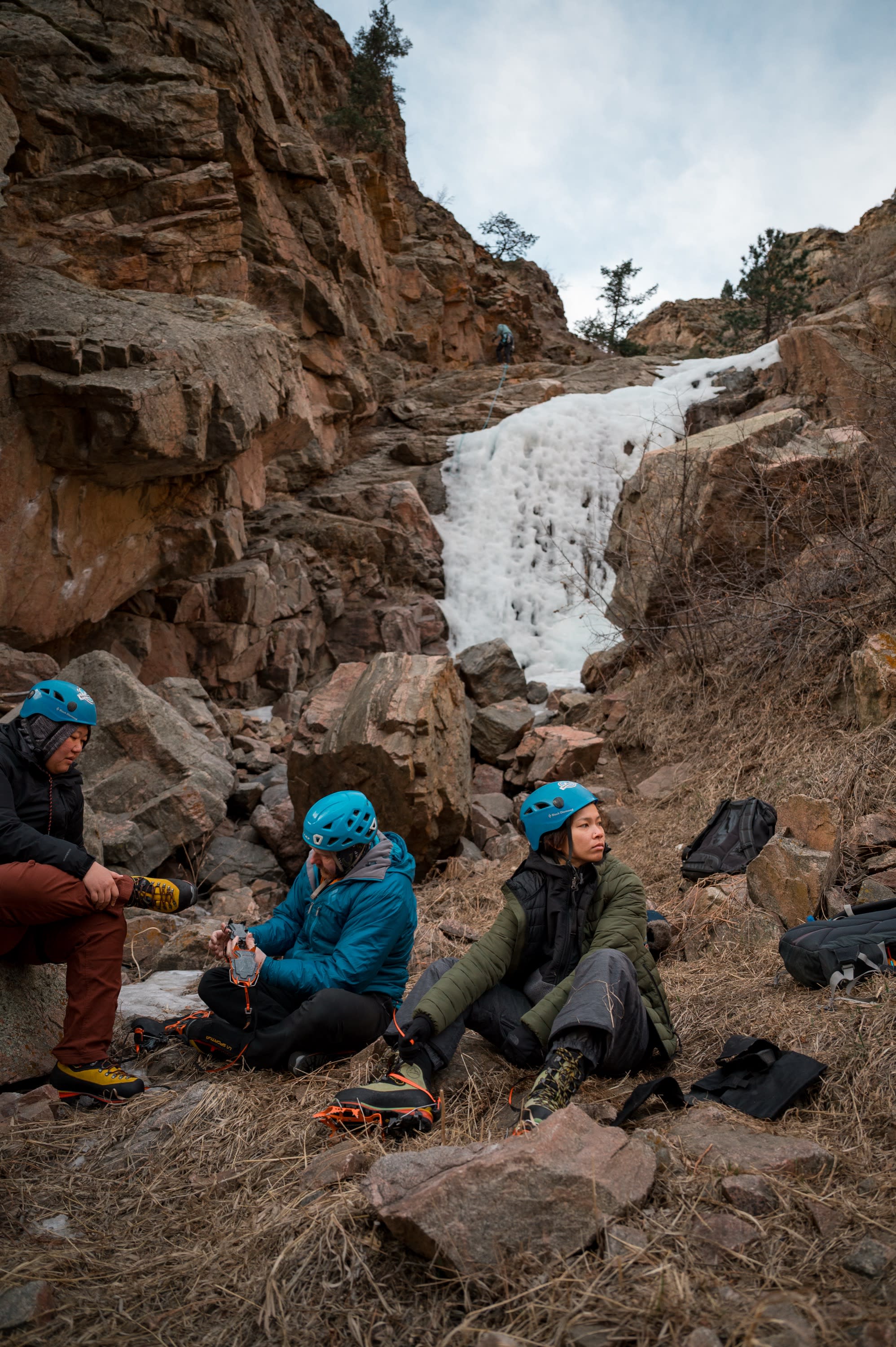 Cruxing in Color ice climbing event — climber portrait