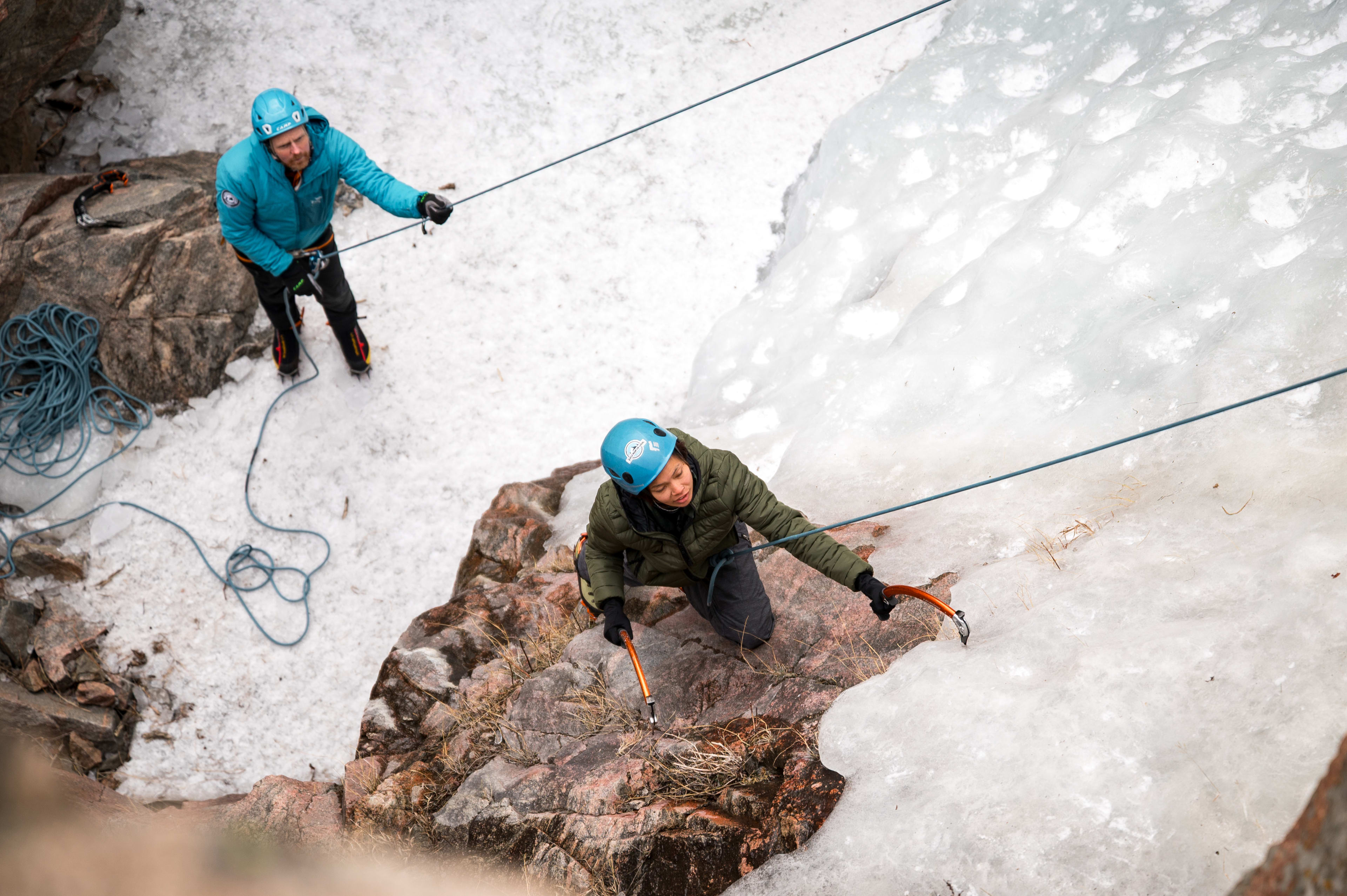 Cruxing in Color ice climbing event — mountain vista