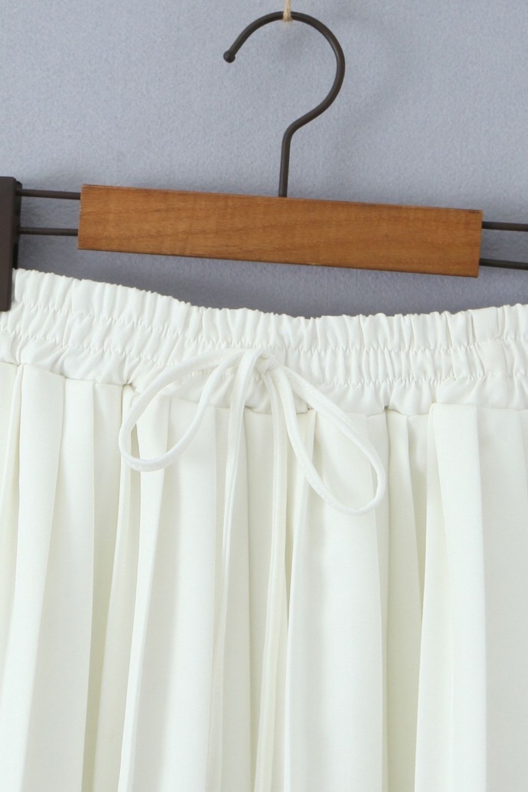 V-neck Sleeveless Button Suit Vest + Pleated Lace-up Skirt