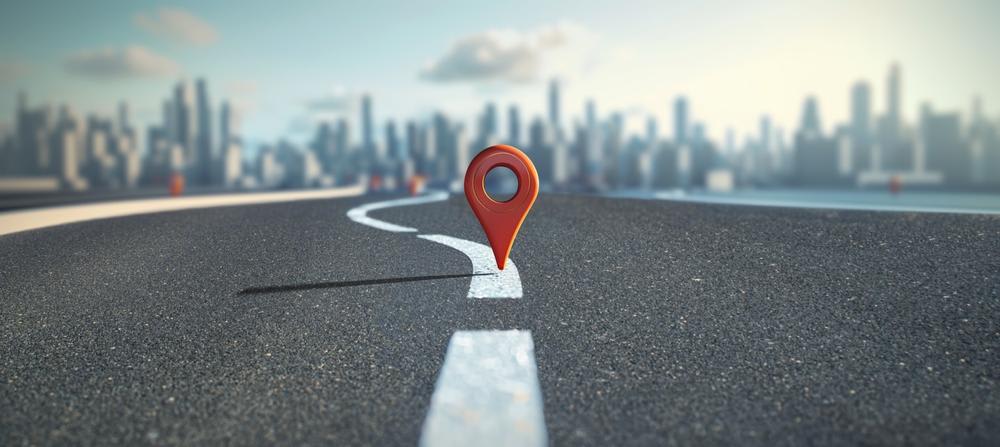 A red mark on the road highlighting the best locations to buy private party vehicles for flipping