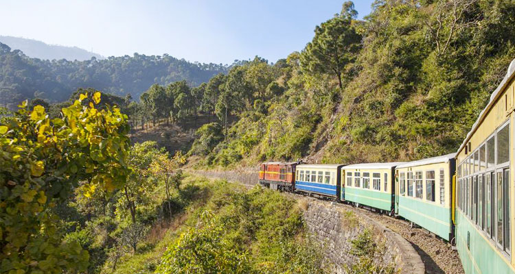 Toy train on arched bridge