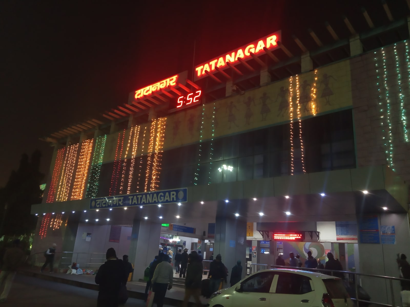 Tatanagar Junction entrance with illuminated station name at night