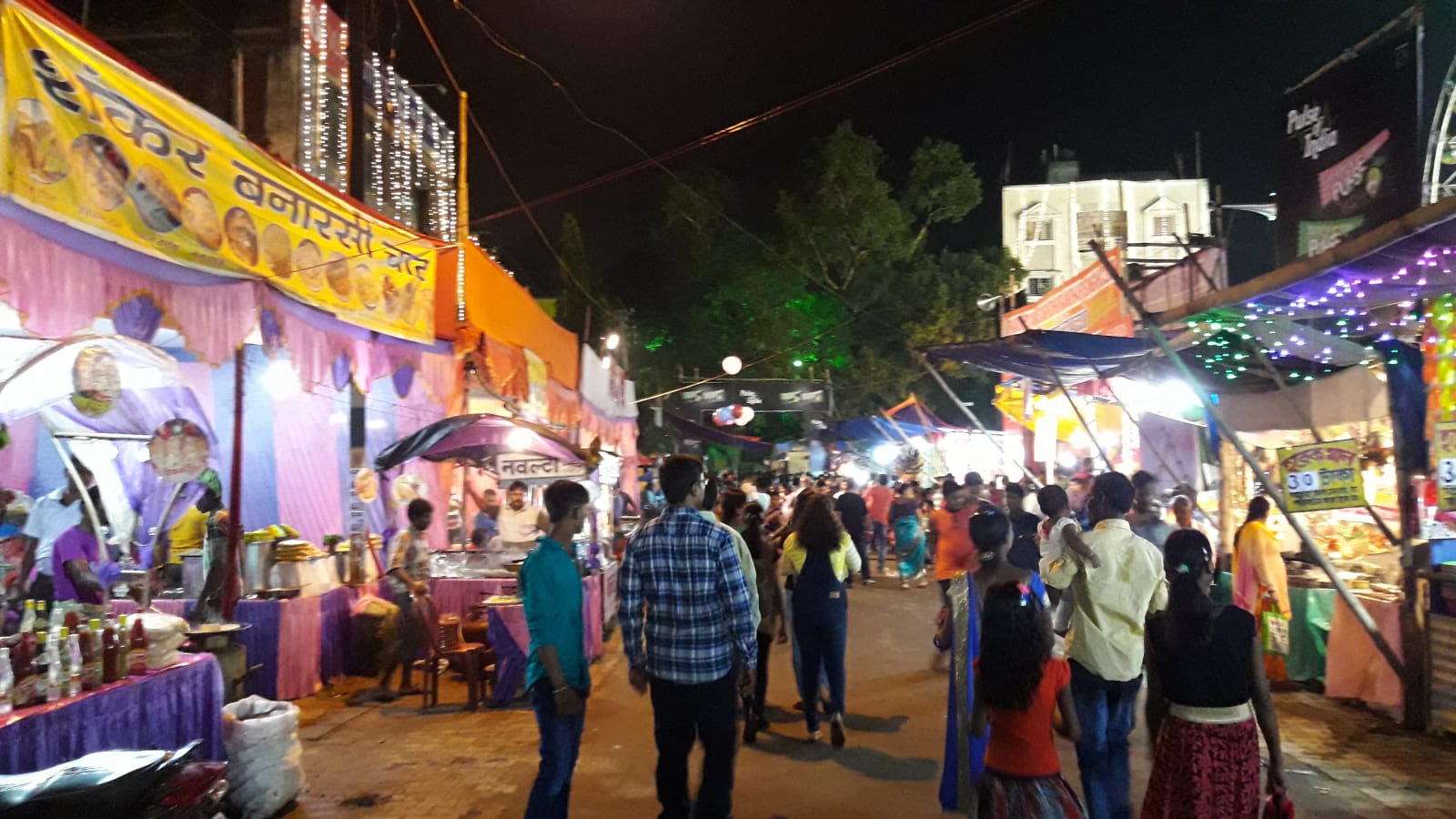 Jamshedpur Durga Puja mela stalls and visitors at night, archival 2016 photograph