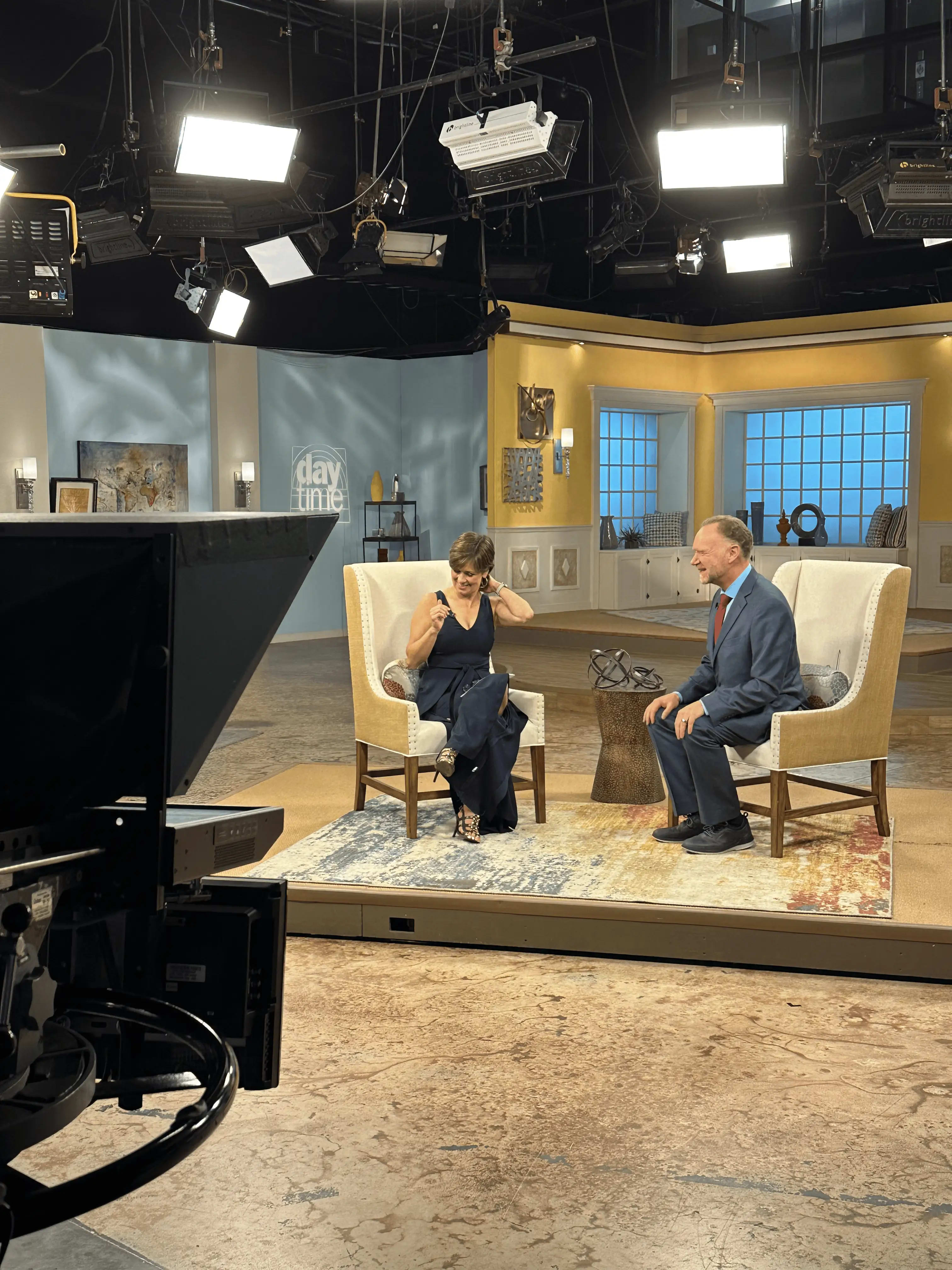 Wide studio shot with Jeff Peoples and host