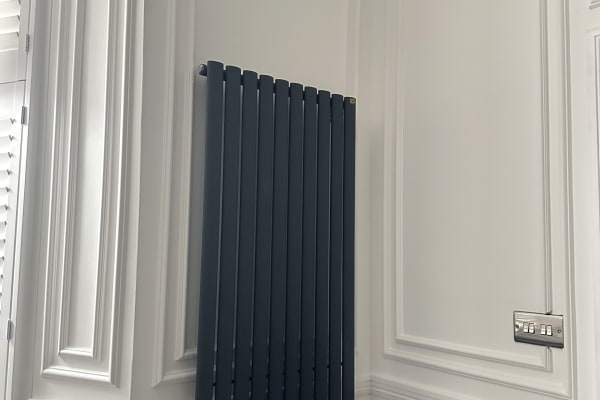 Skirting board installation in a modern living room